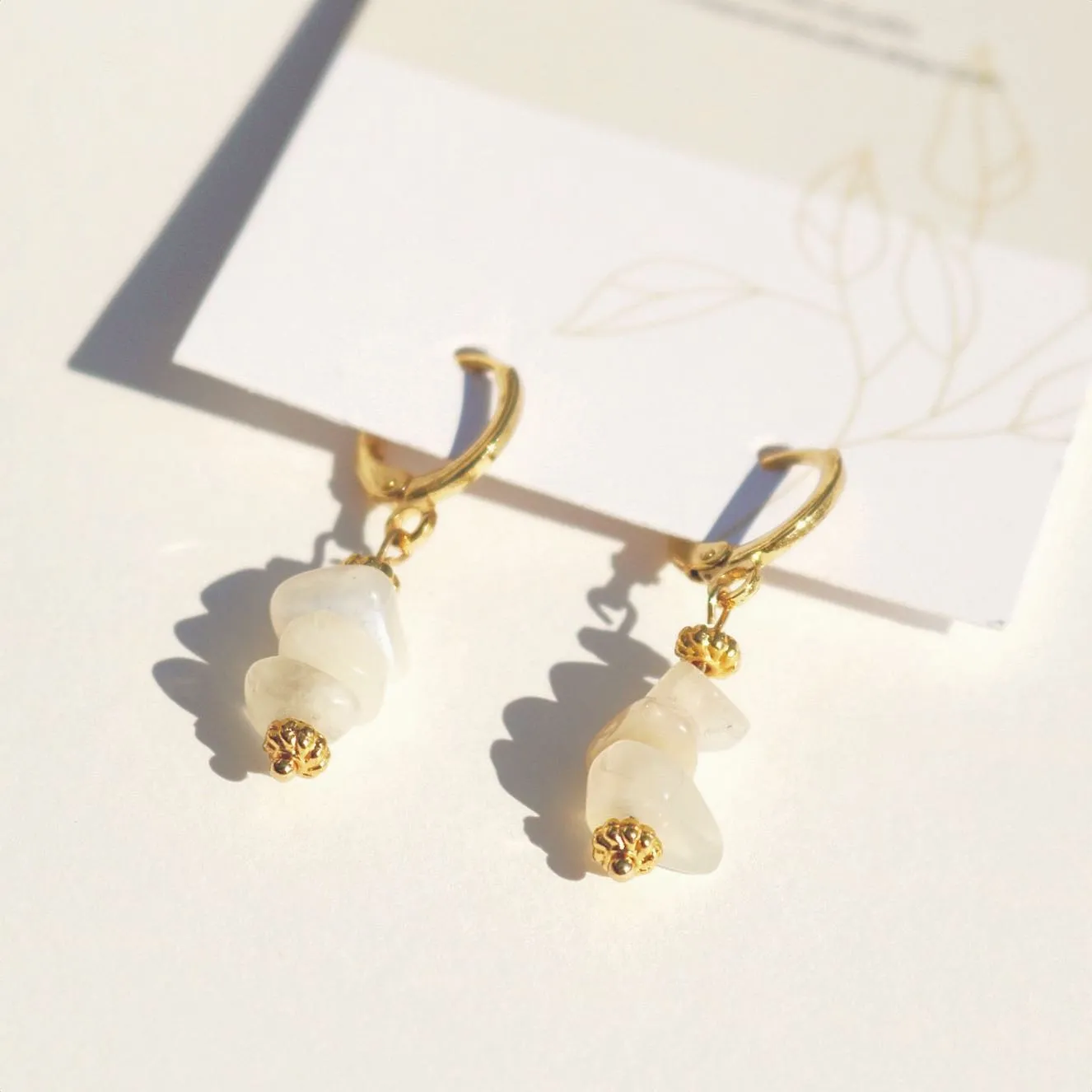 CLIP ON LILY MOONSTONE HUGGIE EARRINGS IN 18K GOLD