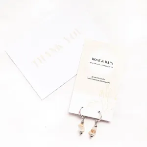 CLIP ON LILY MOONSTONE HUGGIE EARRINGS IN PLATINUM