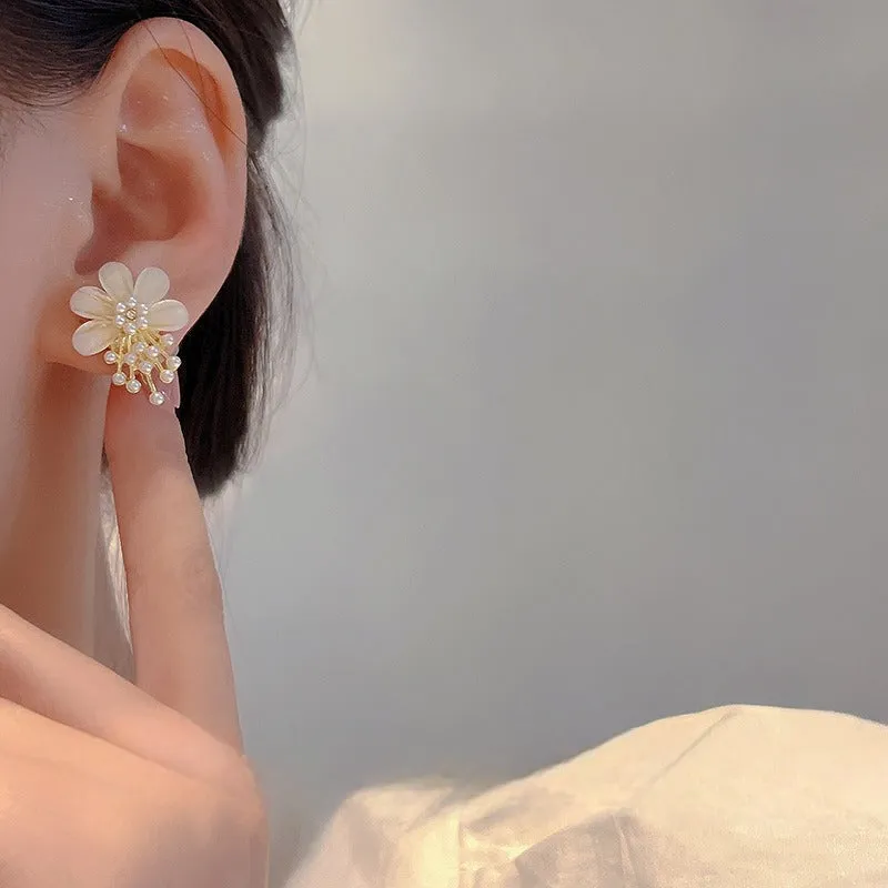 Large White Flower Coil Clip On Earrings